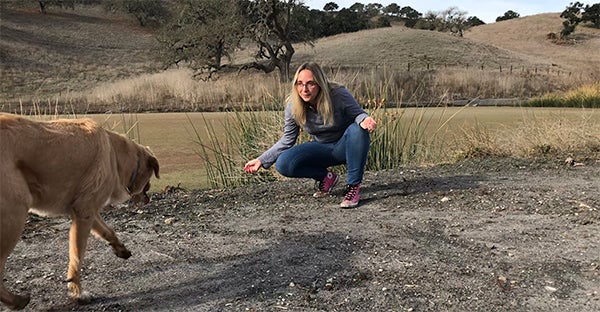 woman training her dog